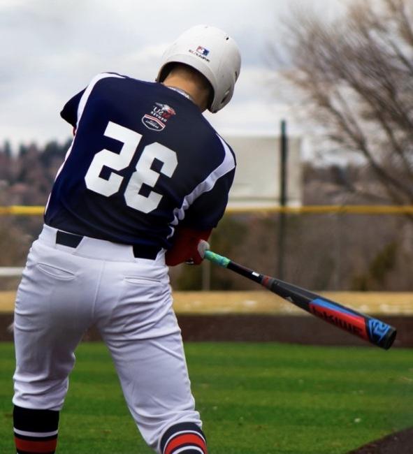 Club Baseball batter taking a swing